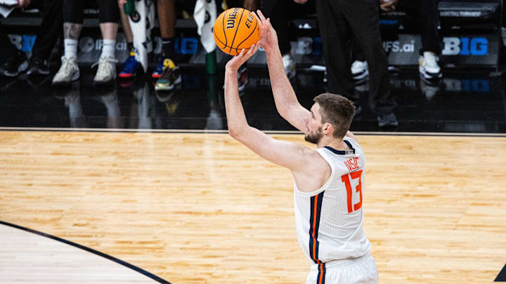 Mar 13, 2025; Indianapolis, IN, USA; Illinois Fighting Illini center Tomislav Ivisic (13) shoots the ball in the first half against the Iowa Hawkeyes at Gainbridge Fieldhouse. Mandatory Credit: Trevor Ruszkowski-Imagn Images