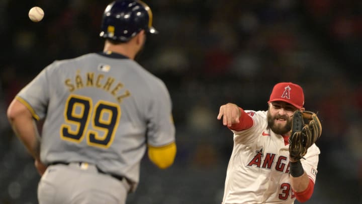 Jun 19, 2024; Anaheim, California, USA; Milwaukee Brewers catcher Gary Sanchez (99) is out as Los Angeles Angels second baseman Michael Stefanic (38) throws to first for a double play in the ninth inning at Angel Stadium. Mandatory Credit: Jayne Kamin-Oncea-USA TODAY Sports Jun 19, 2024; Anaheim, California, USA; Milwaukee Brewers catcher Gary Sanchez (99) is out as Los Angeles Angels second baseman Michael Stefanic (38) throws to first for a double play in the ninth inning at Angel Stadium. Mandatory Credit: Jayne Kamin-Oncea-USA TODAY Sports