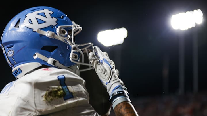 Nov 29, 2025; Raleigh, North Carolina, USA;  North Carolina Tar Heels wide receiver Jordan Shipp (1) celebrates a touchdown during the first half of the game against NC State Wolfpack at Carter-Finley Stadium.  Mandatory Credit: Jaylynn Nash-Imagn Images