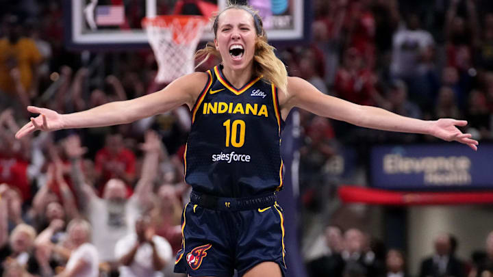 Indiana Fever guard Lexie Hull (10) celebrates after scoring a three-point field goal during the second half of a game against the Seattle Storm on Sunday, Aug. 18, 2024, at Gainbridge Fieldhouse in Indianapolis. The Fever defeated the Storm 92-75. Indiana Fever guard Lexie Hull (10) celebrates after scoring a three-point field goal during the second half of a game against the Seattle Storm on Sunday, Aug. 18, 2024, at Gainbridge Fieldhouse in Indianapolis. The Fever defeated the Storm 92-75.