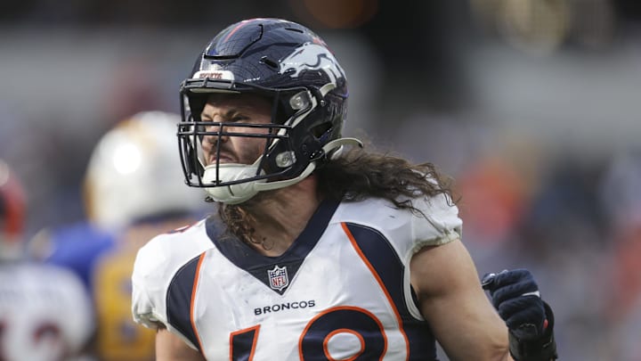 Denver Broncos inside linebacker Alex Singleton (49) celebrates in the first half in a game against the Los Angeles Chargers at SoFi Stadium.