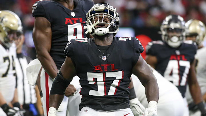 Sep 11, 2022; Atlanta, Georgia, USA; Atlanta Falcons defensive end Grady Jarrett (97) celebrates after a sack against the New Orleans Saints in the second quarter at Mercedes-Benz Stadium. Mandatory Credit: Brett Davis-Imagn Images
