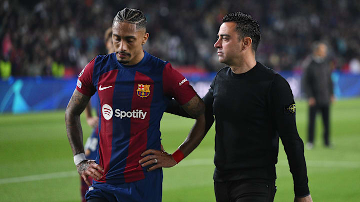 Raphinha (left) did not have a happy time under Xavi Hernandez