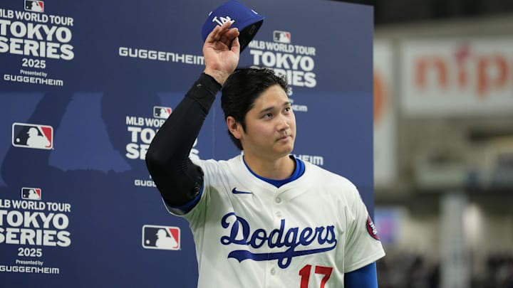 Mar 19, 2025; Bunkyo, Tokyo, JPN; Los Angeles Dodgers designated hitter Shohei Ohtani (17) tips his hat to fans after defeating the Chicago Cubs during the Tokyo Series at Tokyo Dome. Mandatory Credit: Darren Yamashita-Imagn Images