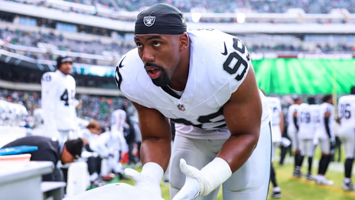 Dec 14, 2025; Philadelphia, Pennsylvania, USA; Las Vegas Raiders defensive end Tyree Wilson (9) warms up by the heater prior to the game against the Philadelphia Eagles at Lincoln Financial Field. Mandatory Credit: Bill Streicher-Imagn Images