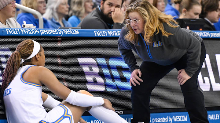 Mar 21, 2025; Los Angeles, California, USA; UCLA Bruins head coach Cori Close talks to UCLA Bruins forward Janiah Barker (0) during an NCAA Tournament first-round game against the Southern Lady Jaguars at Pauley Pavilion presented by Wescom. Mandatory Credit: Robert Hanashiro-Imagn Images