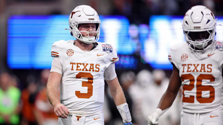 Jan 1, 2025; Atlanta, GA, USA; Texas Longhorns quarterback Quinn Ewers (3) looks on during the first half of the Peach Bowl at Mercedes-Benz Stadium. Mandatory Credit: Brett Davis-Imagn Images Jan 1, 2025; Atlanta, GA, USA; Texas Longhorns quarterback Quinn Ewers (3) looks on during the first half of the Peach Bowl at Mercedes-Benz Stadium. Mandatory Credit: Brett Davis-Imagn Images