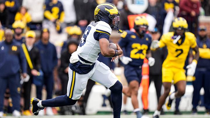 Michigan quarterback Bryce Underwood (19) keeps the ball for a run against Team Maize during the spring game at Michigan Stadium in Ann Arbor on Saturday, April 18, 2026.