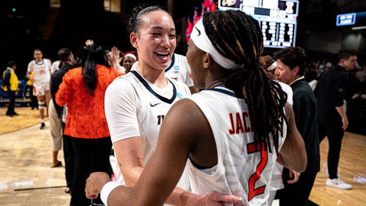 Illinois guard Maddie Webber (34) and guard Destiny Jackson (2) celebrate defeating Colorado in the first round of the NCAA college basketball tournament at Memorial Gym in Nashville, Tenn., Saturday, March 21, 2026.