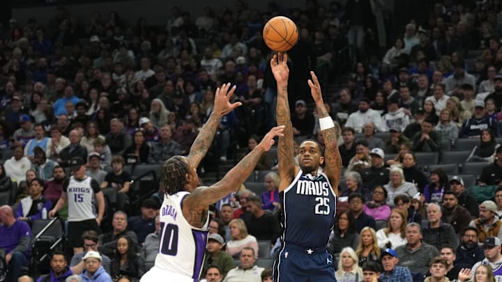 Dec 30, 2024; Sacramento, California, USA; Dallas Mavericks forward P.J. Washington (25) shoots against Sacramento Kings forward DeMar DeRozan (10) during the first quarter at Golden 1 Center. Mandatory Credit: Darren Yamashita-Imagn Images Dec 30, 2024; Sacramento, California, USA; Dallas Mavericks forward P.J. Washington (25) shoots against Sacramento Kings forward DeMar DeRozan (10) during the first quarter at Golden 1 Center. Mandatory Credit: Darren Yamashita-Imagn Images