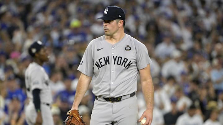 Oct 26, 2024; Los Angeles, California, USA; New York Yankees pitcher Carlos Rodon (55) reacts in the third inning against the Los Angeles Dodgers during game two of the 2024 MLB World Series at Dodger Stadium. Mandatory Credit: Jayne Kamin-Oncea-Imagn Images Oct 26, 2024; Los Angeles, California, USA; New York Yankees pitcher Carlos Rodon (55) reacts in the third inning against the Los Angeles Dodgers during game two of the 2024 MLB World Series at Dodger Stadium. Mandatory Credit: Jayne Kamin-Oncea-Imagn Images