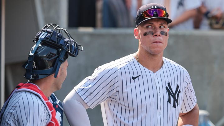 Jul 6, 2024; Bronx, New York, USA; New York Yankees center fielder Aaron Judge (99) looks back while talking with catcher Jose Trevino (39) after the game against the Boston Red Sox at Yankee Stadium. Mandatory Credit: Vincent Carchietta-USA TODAY Sports
