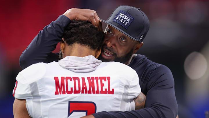 Dec 14, 2024; Atlanta, GA, USA; Jackson State Tigers head coach T.C. Taylor talks to defensive back Robert McDaniel (3) before a game against the South Carolina State Bulldogs at Mercedes-Benz Stadium. Mandatory Credit: Brett Davis-Imagn Images
