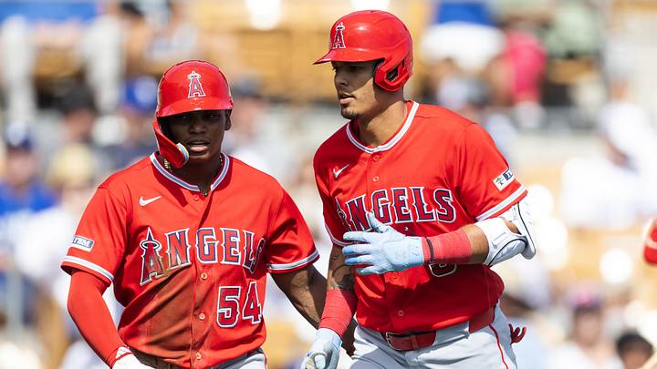Mar 1, 2026; Phoenix, Arizona, USA; Los Angeles Angels outfielder Nelson Rada (54) with designated hitter Vaughn Grissom against the Los Angeles Dodgers during a spring training game at Camelback Ranch-Glendale. Mandatory Credit: Mark J. Rebilas-Imagn Images