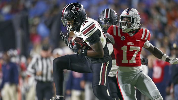 Nov 1, 2025; Oxford, Mississippi, USA; South Carolina Gamecocks defensive back Jalon Kilgore (24) intercepts a pass intended for Mississippi Rebels wide receiver Winston Watkins (17) during the second quarter at Vaught-Hemingway Stadium. Mandatory Credit: Petre Thomas-Imagn Images