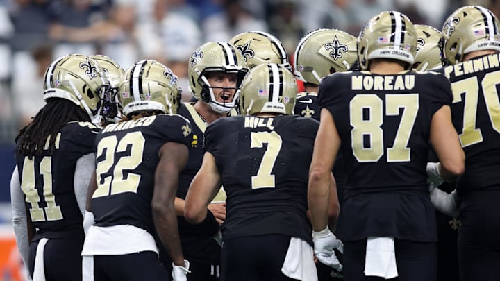 Sep 15, 2024; Arlington, Texas, USA; New Orleans Saints quarterback Derek Carr (4) calls a play against the Dallas Cowboys in the second quarter at AT&T Stadium. Mandatory Credit: Tim Heitman-Imagn Images
