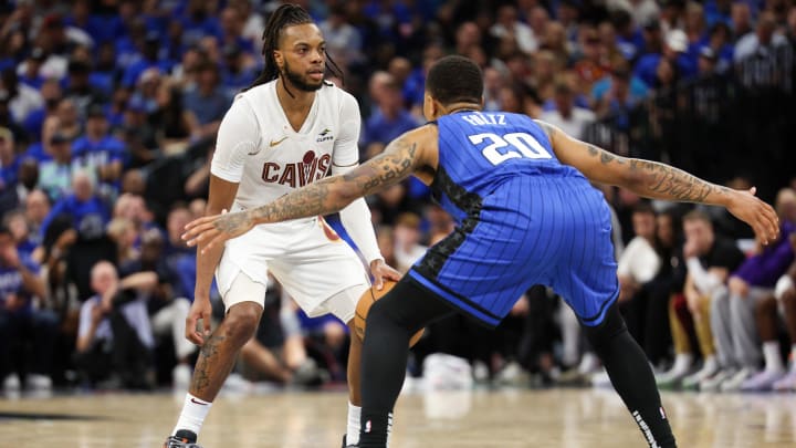 Apr 27, 2024; Orlando, Florida, USA; Orlando Magic guard Markelle Fultz (20) guards Cleveland Cavaliers guard Darius Garland (10) in the fourth quarter during game four of the first round for the 2024 NBA playoffs at Kia Center. Mandatory Credit: Nathan Ray Seebeck-USA TODAY Sports