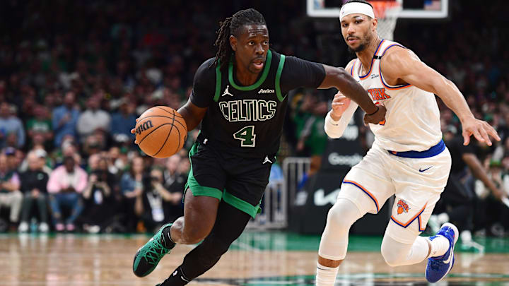 May 14, 2025; Boston, Massachusetts, USA; Boston Celtics guard Jrue Holiday (4) controls the ball while New York Knicks guard Josh Hart (3) defends in the second half during game five of the second round for the 2025 NBA Playoffs at TD Garden. Mandatory Credit: Bob DeChiara-Imagn Images