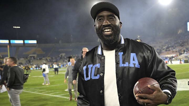 Nov 8, 2024; Pasadena, California, USA;  UCLA Bruins head coach DeShaun Foster leaves the field with the game ball after defeating the Iowa Hawkeyes at the Rose Bowl. Mandatory Credit: Jayne Kamin-Oncea-Imagn Images