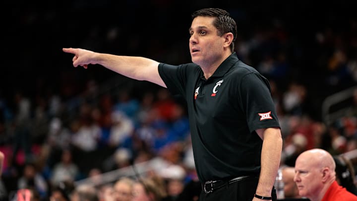 Mar 11, 2026; Kansas City, MO, USA; Cincinnati Bearcats coach Wes Miller directs game play during the first half against the UCF Knights at T-Mobile Center. Mandatory Credit: William Purnell-Imagn Images