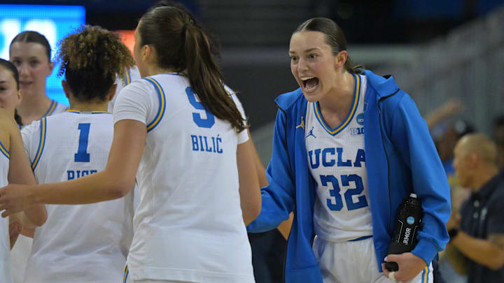 Mar 23, 2026; Los Angeles, CA, USA;  UCLA Bruins forward Angela Dugalic (32) reacts after a three point basket by UCLA Bruins guard Lena Bilic (9) in the first half against the Oklahoma State Cowboys at Pauley Pavilion. Mandatory Credit: Jayne Kamin-Oncea-Imagn Images