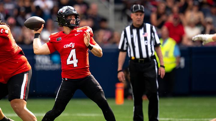 Cincinnati Bearcats quarterback JC French IV (4) throws a pass in the first quarter of the football game between Cincinnati Bearcats and Miami RedHawks at TQL  Stadium in Cincinnati on Saturday, September 19, 2026.