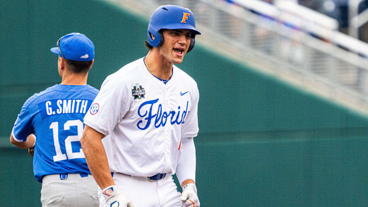 Jun 19, 2024; Omaha, NE, USA; Florida Gators first baseman Jac Caglianone (14) reacts after hitting a double against the Kentucky Wildcats during the first inning at Charles Schwab Field Omaha. Mandatory Credit: Dylan Widger-Imagn Images