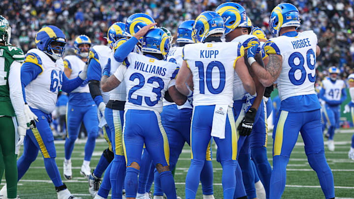 Dec 22, 2024; East Rutherford, New Jersey, USA; Los Angeles Rams running back Kyren Williams (23) celebrates his touchdown with teammates during the first half against the New York Jets at MetLife Stadium. Mandatory Credit: Vincent Carchietta-Imagn Images Dec 22, 2024; East Rutherford, New Jersey, USA; Los Angeles Rams running back Kyren Williams (23) celebrates his touchdown with teammates during the first half against the New York Jets at MetLife Stadium. Mandatory Credit: Vincent Carchietta-Imagn Images