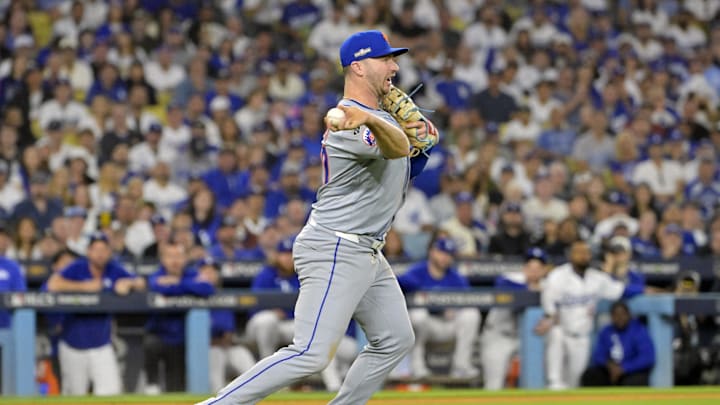 Oct 20, 2024; Los Angeles, California, USA; New York Mets first baseman Pete Alonso (20) fields the ball hit by Los Angeles Dodgers second baseman Chris Taylor (not pictured) in the sixth inning during game six of the NLCS for the 2024 MLB playoffs at Dodger Stadium.
