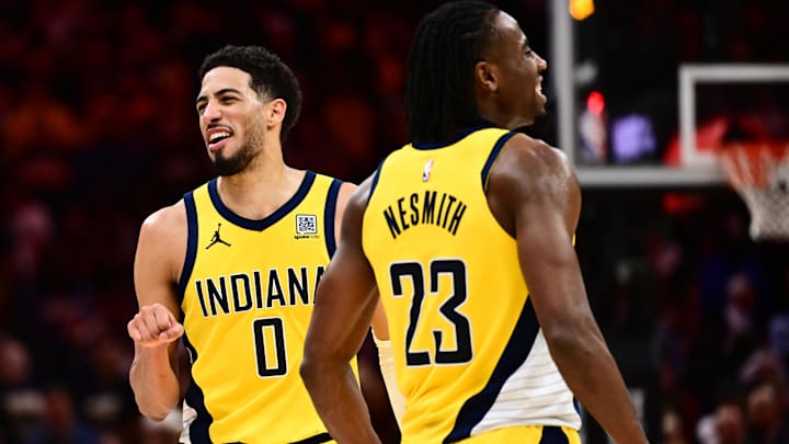 May 13, 2025; Cleveland, Ohio, USA; Indiana Pacers forward Aaron Nesmith (23) and guard Tyrese Haliburton (0) celebrate during the second half of game five against the Cleveland Cavaliers in the second round for the 2025 NBA Playoffs at Rocket Arena. Mandatory Credit: Ken Blaze-Imagn Images May 13, 2025; Cleveland, Ohio, USA; Indiana Pacers forward Aaron Nesmith (23) and guard Tyrese Haliburton (0) celebrate during the second half of game five against the Cleveland Cavaliers in the second round for the 2025 NBA Playoffs at Rocket Arena. Mandatory Credit: Ken Blaze-Imagn Images