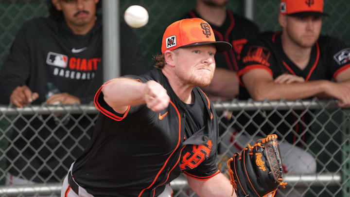 Feb 13, 2025; Scottsdale, AZ, USA; San Francisco Giants pitcher Logan Webb (62) throws in the bullpen during spring training camp.