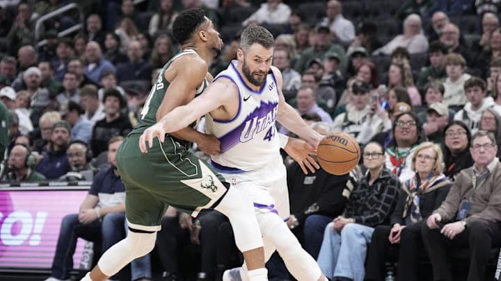 Mar 7, 2026; Milwaukee, Wisconsin, USA; Utah Jazz forward Blake Hinson (2) drives against Milwaukee Bucks forward Giannis Antetokounmpo (34) in the first half at Fiserv Forum. Mandatory Credit: Michael McLoone-Imagn Images