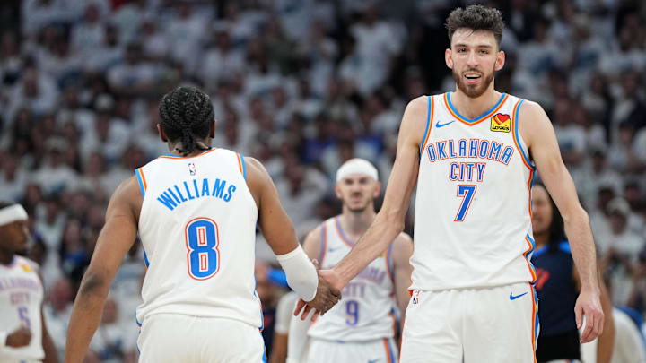 May 26, 2025; Minneapolis, Minnesota, USA;Oklahoma City Thunder forward Chet Holmgren (7) reacts with forward Jalen Williams (8)  in the second half during game four of the western conference finals for the 2025 NBA Playoffs at Target Center. Mandatory Credit: Jesse Johnson-Imagn Images