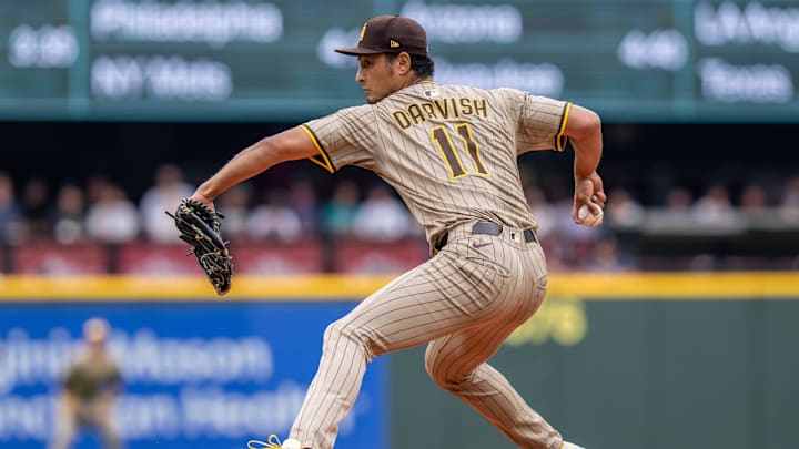 Aug 27, 2025; Seattle, Washington, USA; San Diego Padres starter Yu Darvish (11) delivers a pitch during the third inning against the Seattle Mariners at T-Mobile Park. Mandatory Credit: Stephen Brashear-Imagn Images