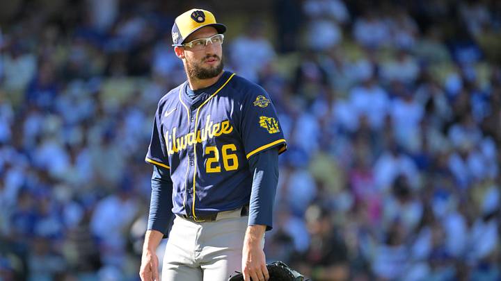 Oct 16, 2025; Los Angeles, California, USA; Milwaukee Brewers pitcher Aaron Ashby (26) reacts after being relieved in the first inning against the Los Angeles Dodgers during game three of the NLCS round for the 2025 MLB playoffs at Dodger Stadium. Mandatory Credit: Jayne Kamin-Oncea-Imagn Images