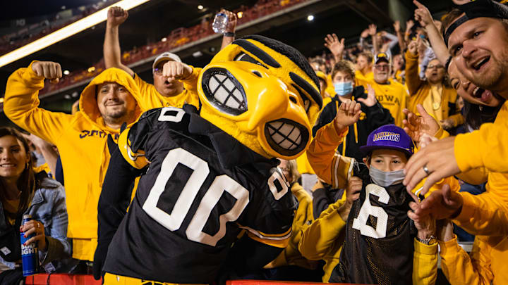 Oct 1, 2021; College Park, Maryland, USA; The Iowa Hawkeyes mascot celebrates with fans during the second half of the game between the Maryland Terrapins and the Iowa Hawkeyes at Capital One Field at Maryland Stadium. Mandatory Credit: Scott Taetsch-Imagn Images Oct 1, 2021; College Park, Maryland, USA; The Iowa Hawkeyes mascot celebrates with fans during the second half of the game between the Maryland Terrapins and the Iowa Hawkeyes at Capital One Field at Maryland Stadium. Mandatory Credit: Scott Taetsch-Imagn Images