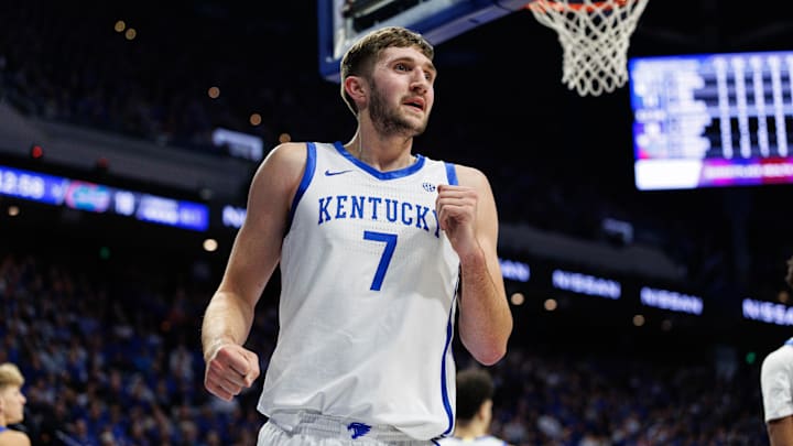 Jan 4, 2025; Lexington, Kentucky, USA; Kentucky Wildcats forward Andrew Carr (7) reacts after being called for a foul during the first half against the Florida Gators at Rupp Arena at Central Bank Center. Mandatory Credit: Jordan Prather-Imagn Images