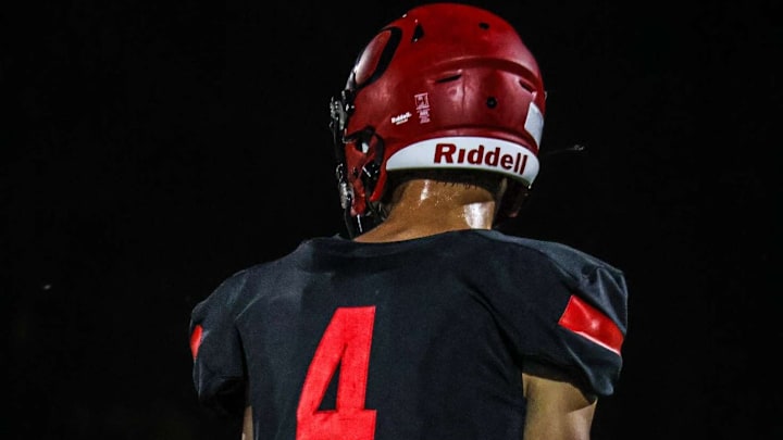 Nate Sims dressed out in football gear