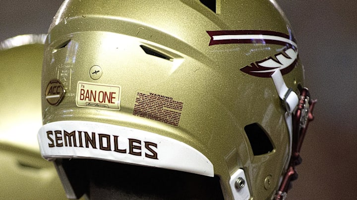 Sep 8, 2018; Tallahassee, FL, USA; Florida State Seminoles had a special sticker on their helmets to honor former FSU player Burt Reynolds who died this past week.  The Florida State Seminoles host the Samford Bulldogs at Doak Campbell Stadium. Florida State won 36-26. Mandatory Credit: Glenn Beil-Imagn Images
