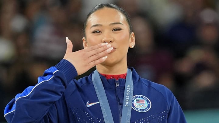 Sunisa Lee of the United States reacts after winning the bronze medal on the second day of gymnastics event finals during the Paris 2024 Olympic Summer Games at Bercy Arena.