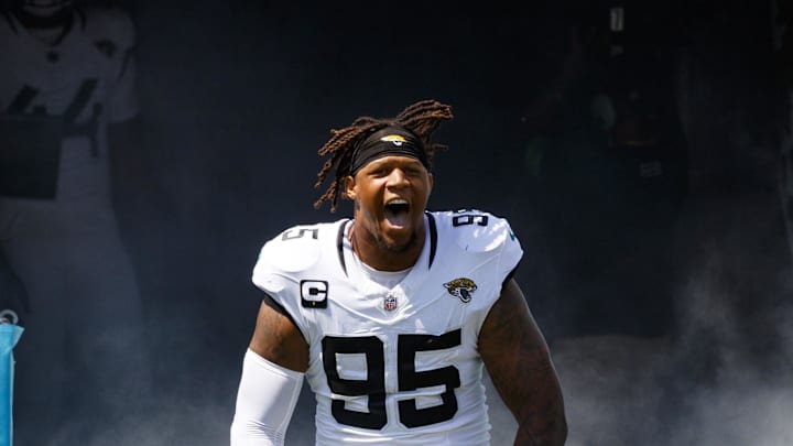 Sep 24, 2023; Jacksonville, Florida, USA; Jacksonville Jaguars defensive lineman Roy Robertson-Harris (95) runs out of the tunnel before the game against the Houston Texans at EverBank Stadium. Mandatory Credit: Morgan Tencza-Imagn Images