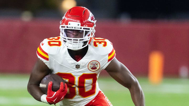 Aug 9, 2025; Glendale, Arizona, USA; Kansas City Chiefs running back Brashard Smith (30) against the Arizona Cardinals during a preseason NFL game at State Farm Stadium. Mandatory Credit: Mark J. Rebilas-Imagn Images