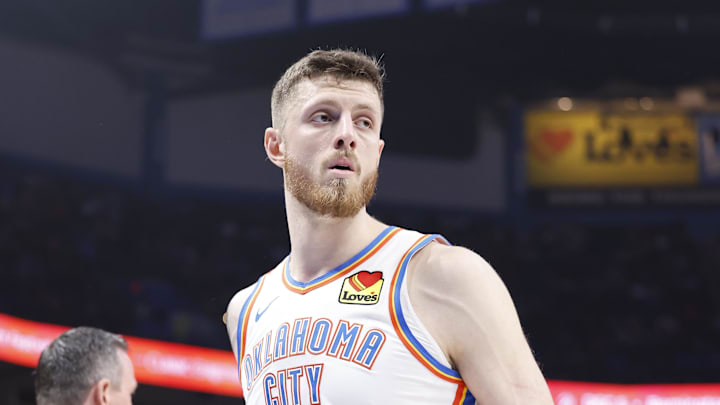 Nov 20, 2024; Oklahoma City, Oklahoma, USA; Oklahoma City Thunder center Isaiah Hartenstein (55) walks down the court during a time out against the Portland Trail Blazers during the second quarter at Paycom Center. Mandatory Credit: Alonzo Adams-Imagn Images