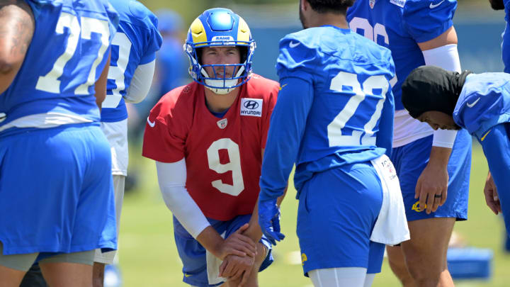 May 28, 2024; Thousand Oaks, CA, USA; Los Angeles Rams quarterback Matthew Stafford (9) talks with running back Blake Corum (22) in the huddle during OTAs at California Lutheran University. Mandatory Credit: Jayne Kamin-Oncea-USA TODAY Sports May 28, 2024; Thousand Oaks, CA, USA; Los Angeles Rams quarterback Matthew Stafford (9) talks with running back Blake Corum (22) in the huddle during OTAs at California Lutheran University. Mandatory Credit: Jayne Kamin-Oncea-USA TODAY Sports