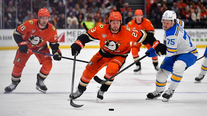 Apr 3, 2026; Anaheim, California, USA; Anaheim Ducks center Mason McTavish (23) moves the puck against St. Louis Blues defenseman Tyler Tucker (75) during the second period at Honda Center. Mandatory Credit: Gary A. Vasquez-Imagn Images Apr 3, 2026; Anaheim, California, USA; Anaheim Ducks center Mason McTavish (23) moves the puck against St. Louis Blues defenseman Tyler Tucker (75) during the second period at Honda Center. Mandatory Credit: Gary A. Vasquez-Imagn Images