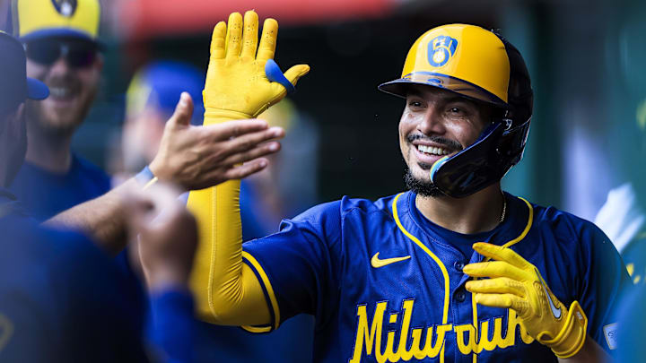 Aug 30, 2024; Cincinnati, Ohio, USA; Milwaukee Brewers shortstop Willy Adames (27) high fives teammates after hitting a solo home run in the second inning against the Cincinnati Reds at Great American Ball Park. Mandatory Credit: Katie Stratman-Imagn Images Aug 30, 2024; Cincinnati, Ohio, USA; Milwaukee Brewers shortstop Willy Adames (27) high fives teammates after hitting a solo home run in the second inning against the Cincinnati Reds at Great American Ball Park. Mandatory Credit: Katie Stratman-Imagn Images