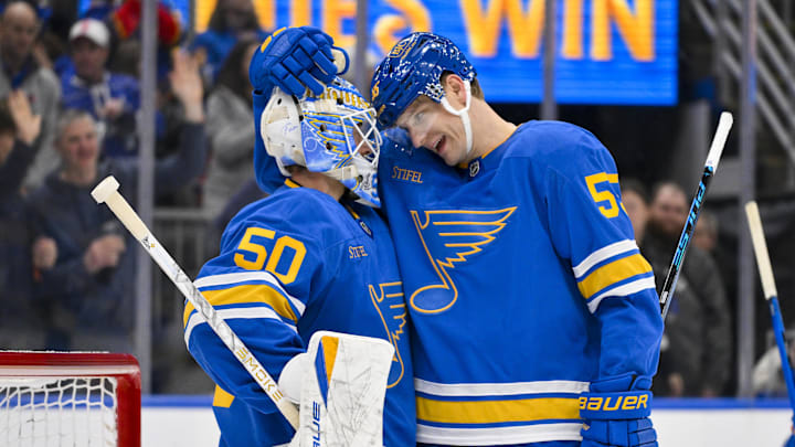 Jan 3, 2026; St. Louis, Missouri, USA; St. Louis Blues goaltender Jordan Binnington (50) celebrates with defenseman Colton Parayko (55) after recording a shutout in a victory over the Montreal Canadiens at Enterprise Center. Mandatory Credit: Jeff Curry-Imagn Images