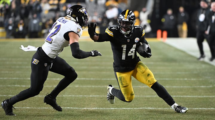 Jan 4, 2026; Pittsburgh, Pennsylvania, USA; Pittsburgh Steelers running back Kenneth Gainwell (14) rushes the ball against Baltimore Ravens safety Alohi Gilman (12) during the first half at Acrisure Stadium. Mandatory Credit: Barry Reeger-Imagn Images Jan 4, 2026; Pittsburgh, Pennsylvania, USA; Pittsburgh Steelers running back Kenneth Gainwell (14) rushes the ball against Baltimore Ravens safety Alohi Gilman (12) during the first half at Acrisure Stadium. Mandatory Credit: Barry Reeger-Imagn Images
