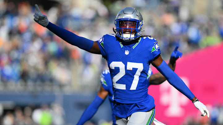 Seattle Seahawks cornerback Riq Woolen celebrates intercepting a pass against the Cleveland Browns. Seattle Seahawks cornerback Riq Woolen celebrates intercepting a pass against the Cleveland Browns.