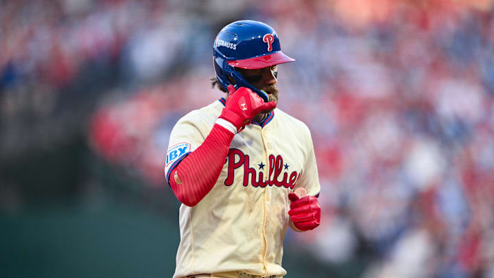 Oct 6, 2024; Philadelphia, Pennsylvania, USA; Philadelphia Phillies first baseman Bryce Harper (3) reacts after hitting a two-run home run against the New York Mets in the sixth inning during game two of the NLDS for the 2024 MLB Playoffs at Citizens Bank Park. Mandatory Credit: Kyle Ross-Imagn Images
